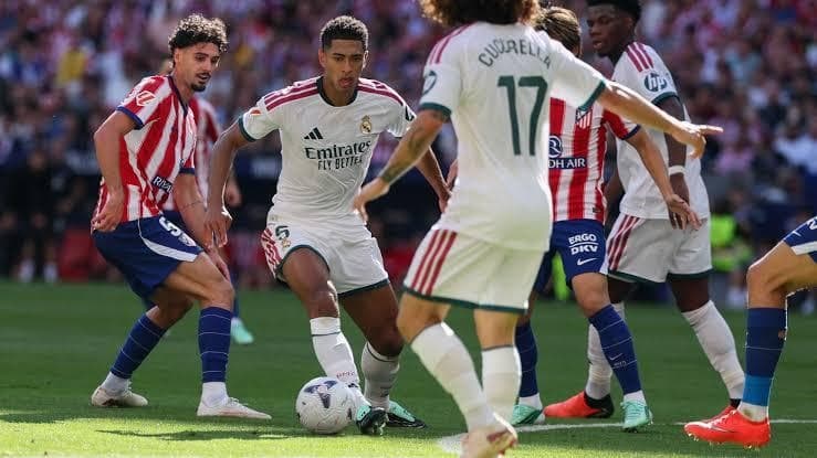 Atlético Madrid tops Real in derby to move second