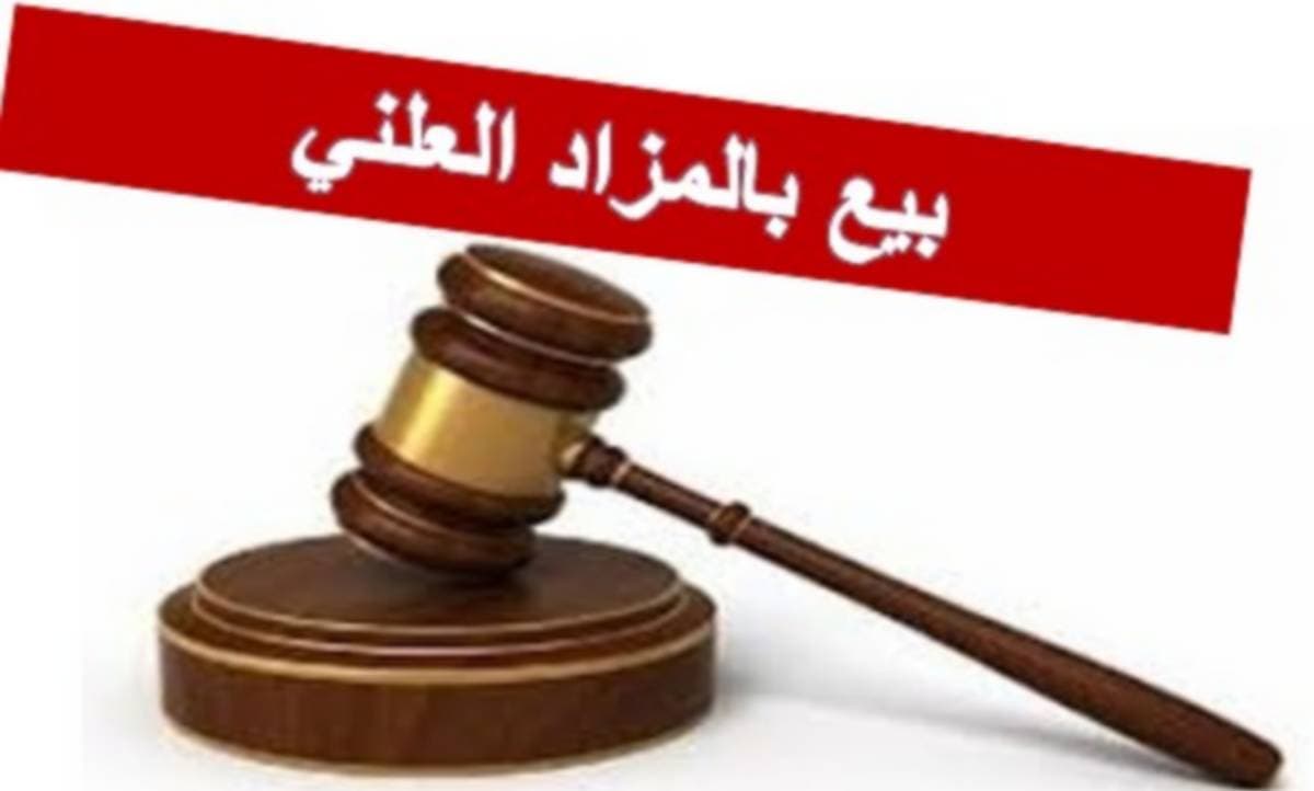 موظف مالي يناقش بيع خمر محجوز في الدهماني