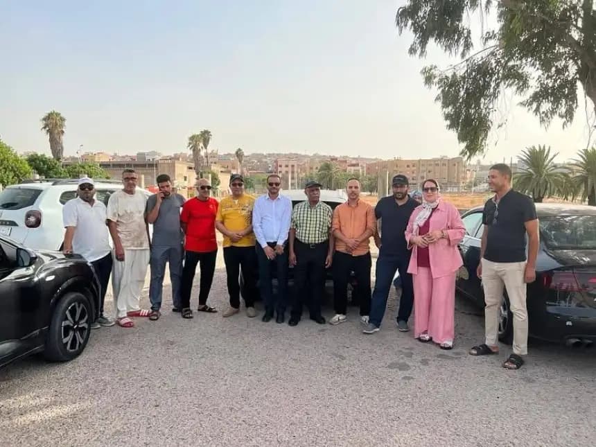 Mayor and council sit in front of Green Park in Sidi Ifni
