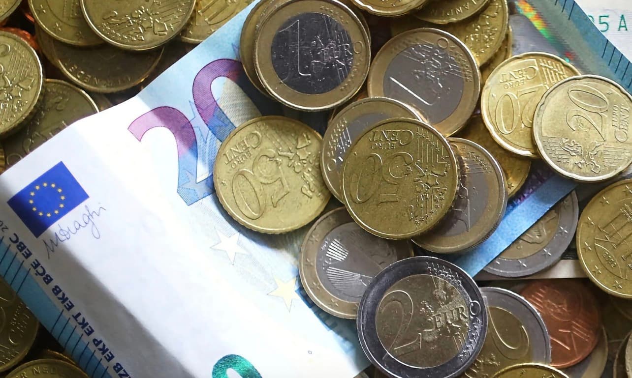 Euro hits 17-month low versus dollar