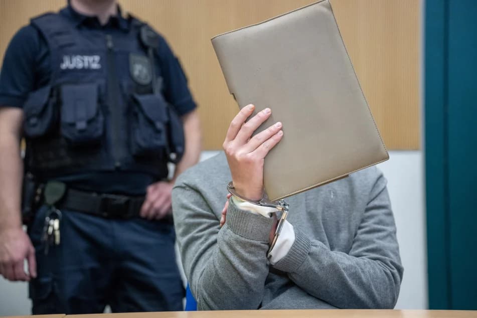 Young man faces trial over family murders