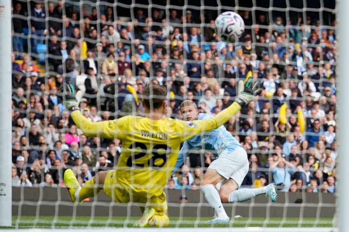 Haaland guides City to tight win