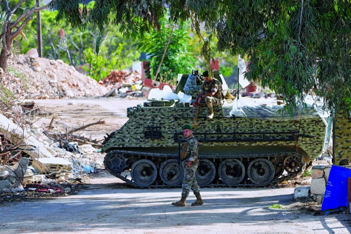 Israel warns of attack over Hezbollah role