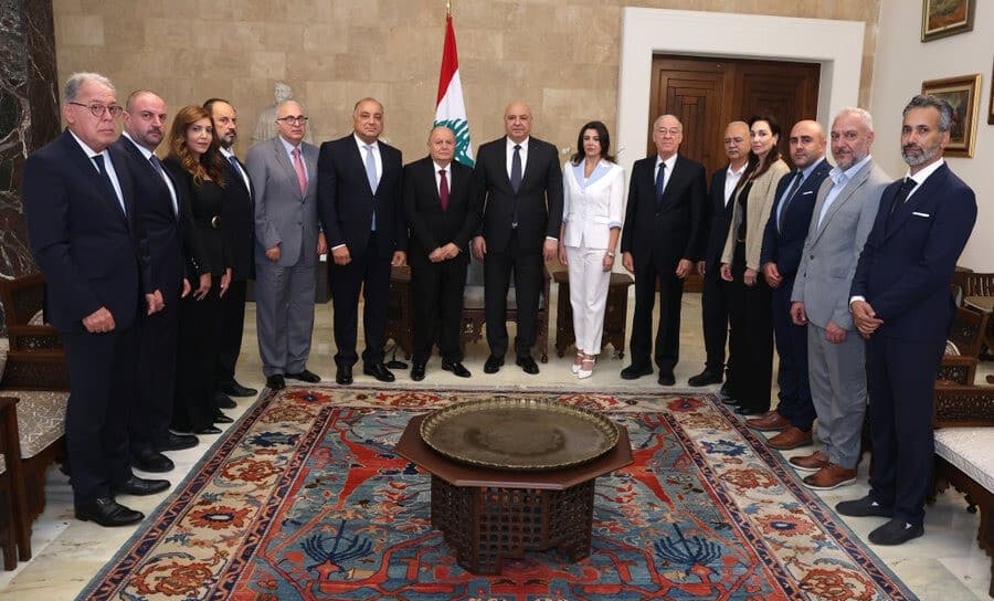 Al-Asmar updates Aoun on social security plan