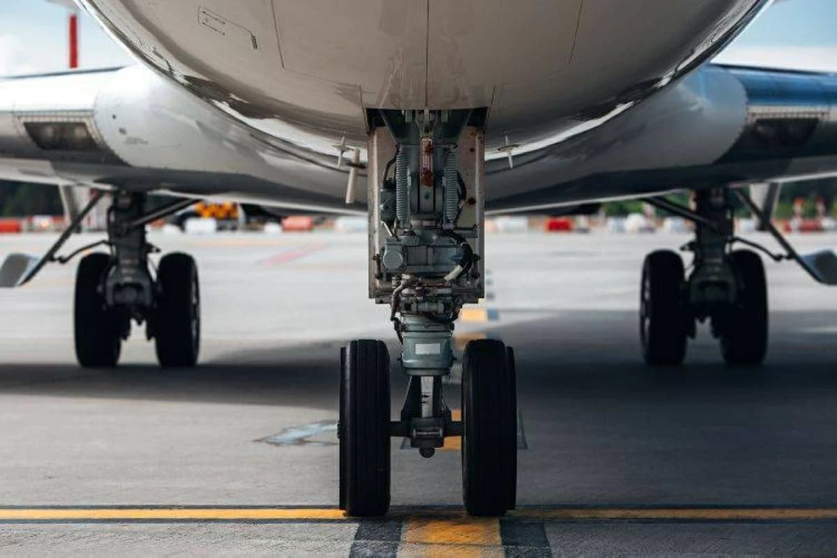 Decomposed body found in aircraft wheel compartment