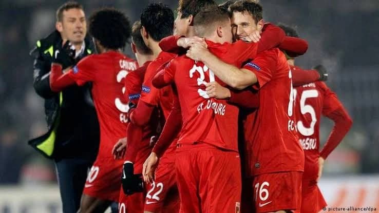Augsburg Moves to Bundesliga Top After Win