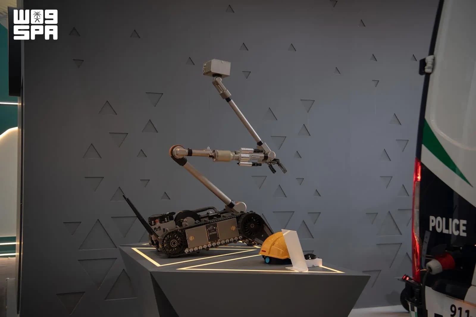 Public security examines Back Bot for suspicious items