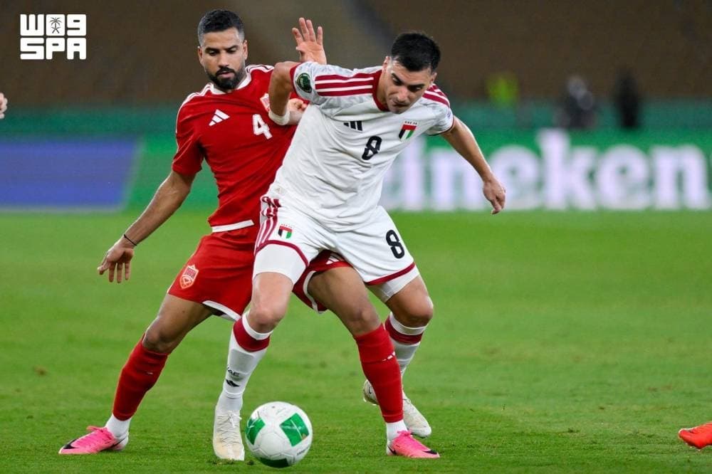 الأبيض يتغلب على الأحمر