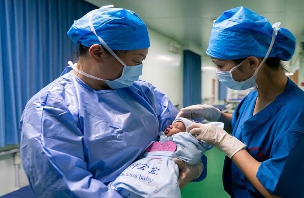 Woman delivers baby at 60