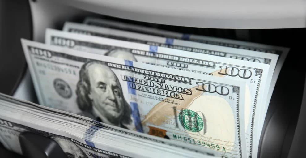Dollar dips amid falling bond yields