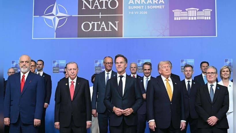 Erdogan gives gun and live ammunition to NATO leaders during summit
