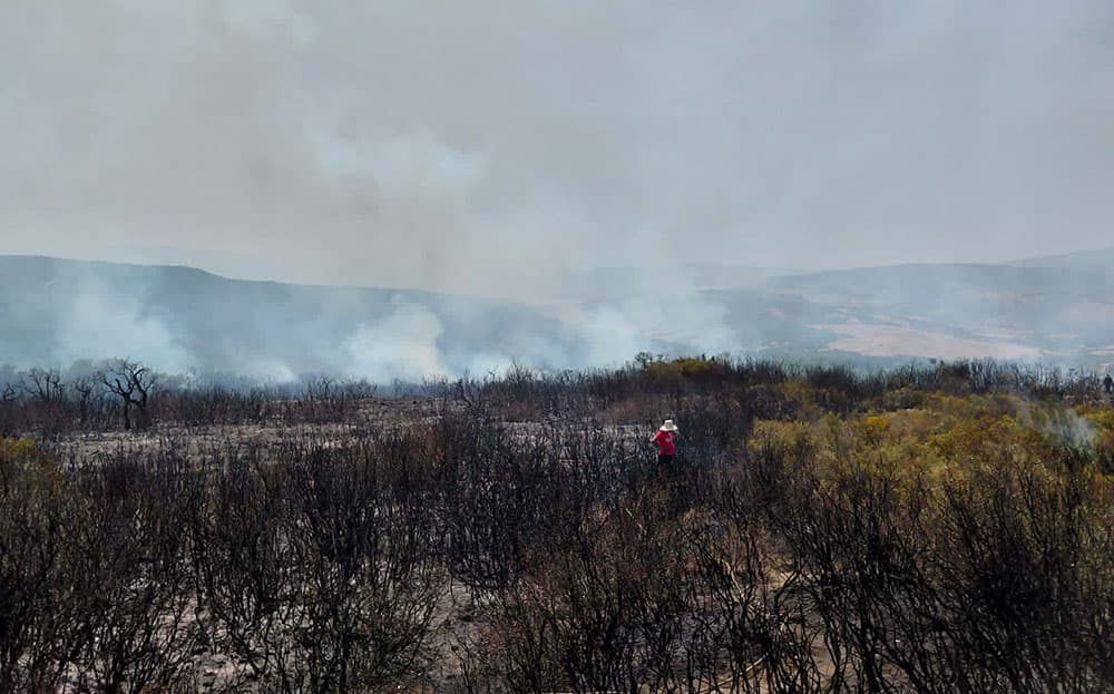 Prisoners Amid Blacksmith's Rope Fire