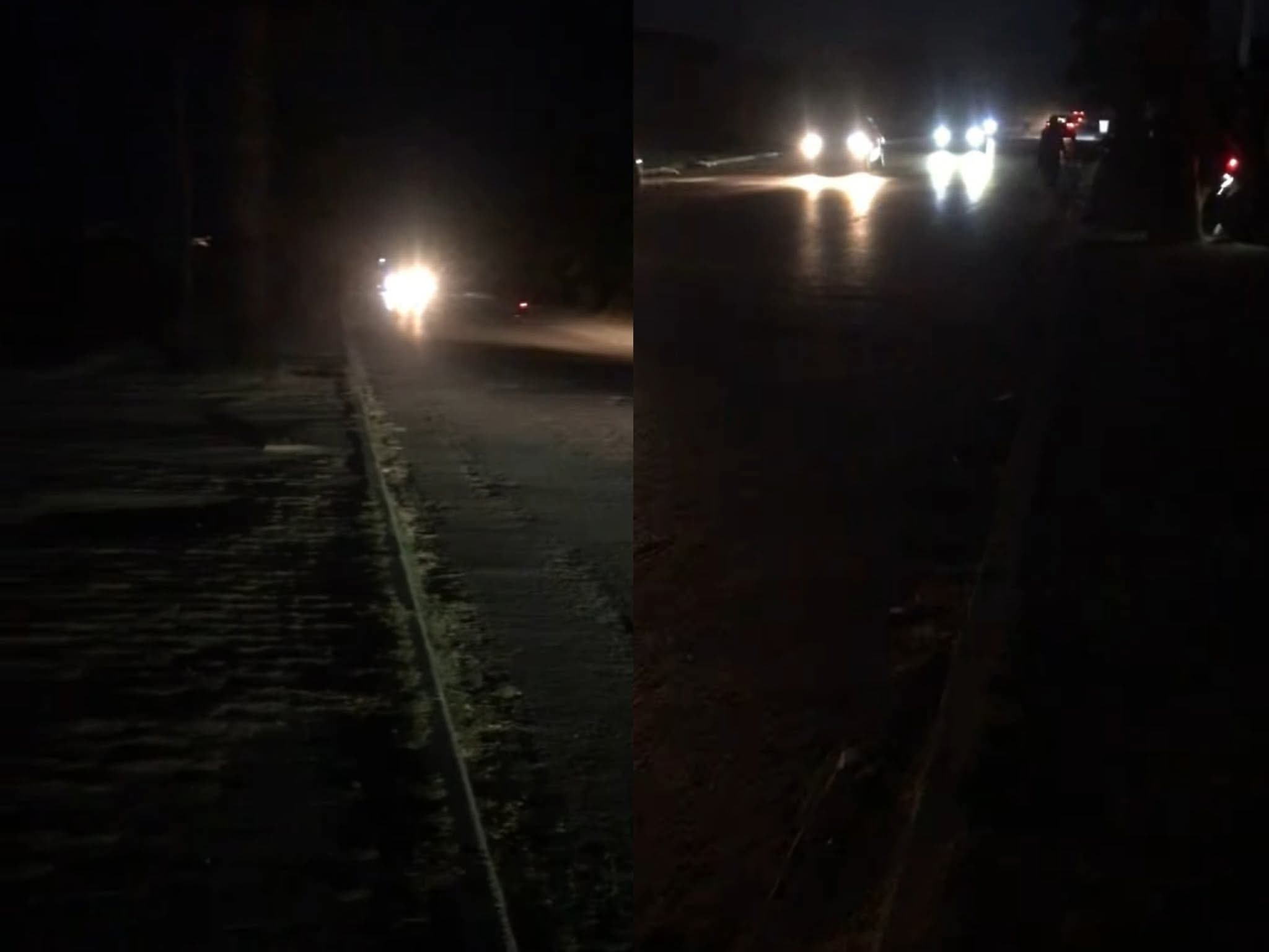 Tamim's house shrouded in darkness with trees blocking the beach view