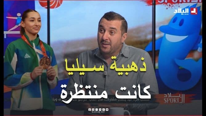 Mohsen Ashouri on Siliya Weikan's medal
