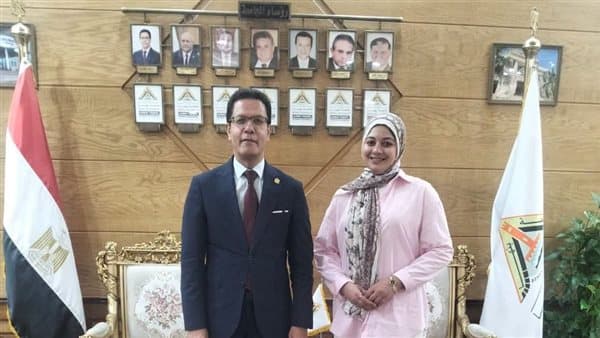 Benha University President awards full scholarship and exempts commerce student from textbook fees in recognition of her efforts
