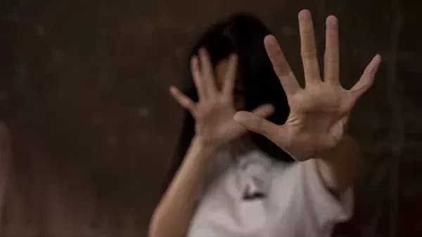 Coach detained over child assault charges