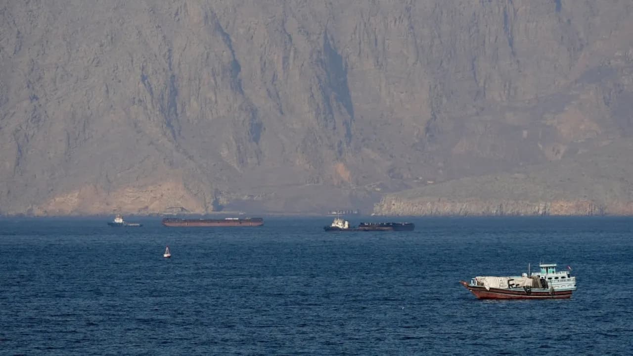 Tehran reports tanker explosions in Hormuz, US denies