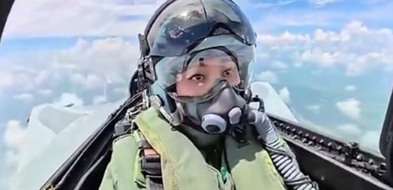 Queen pilots fighter jet solo