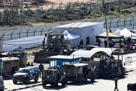 Occupation forces free 12 Gaza prisoners
