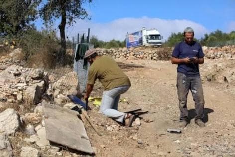 Settlers clash in Al-Mughayir