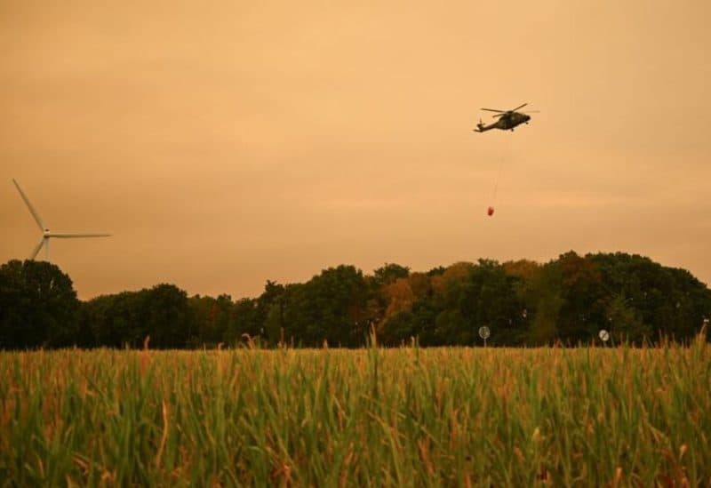 Over 2,000 await return after German forest fire