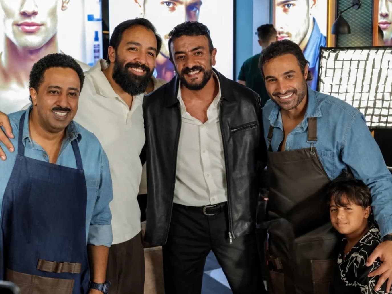 Ahmed Eloua, Amr Youssef, and Ahmed Fahmy in Al-Fil conveyor scene