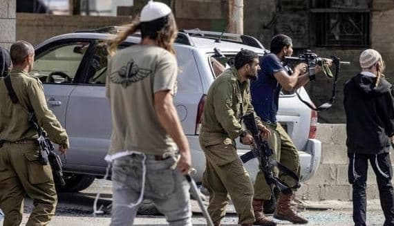 Six Palestinians wounded in settler assault