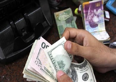 Israel cuts gasoline tax by half shekel