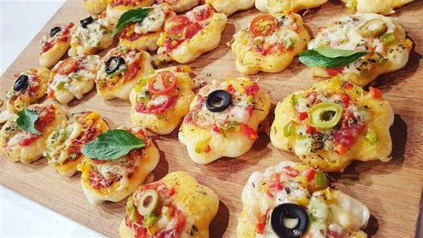 Making mini pizzas for lunch