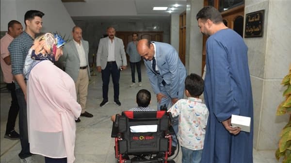 Assiut Governor donates wheelchair to child