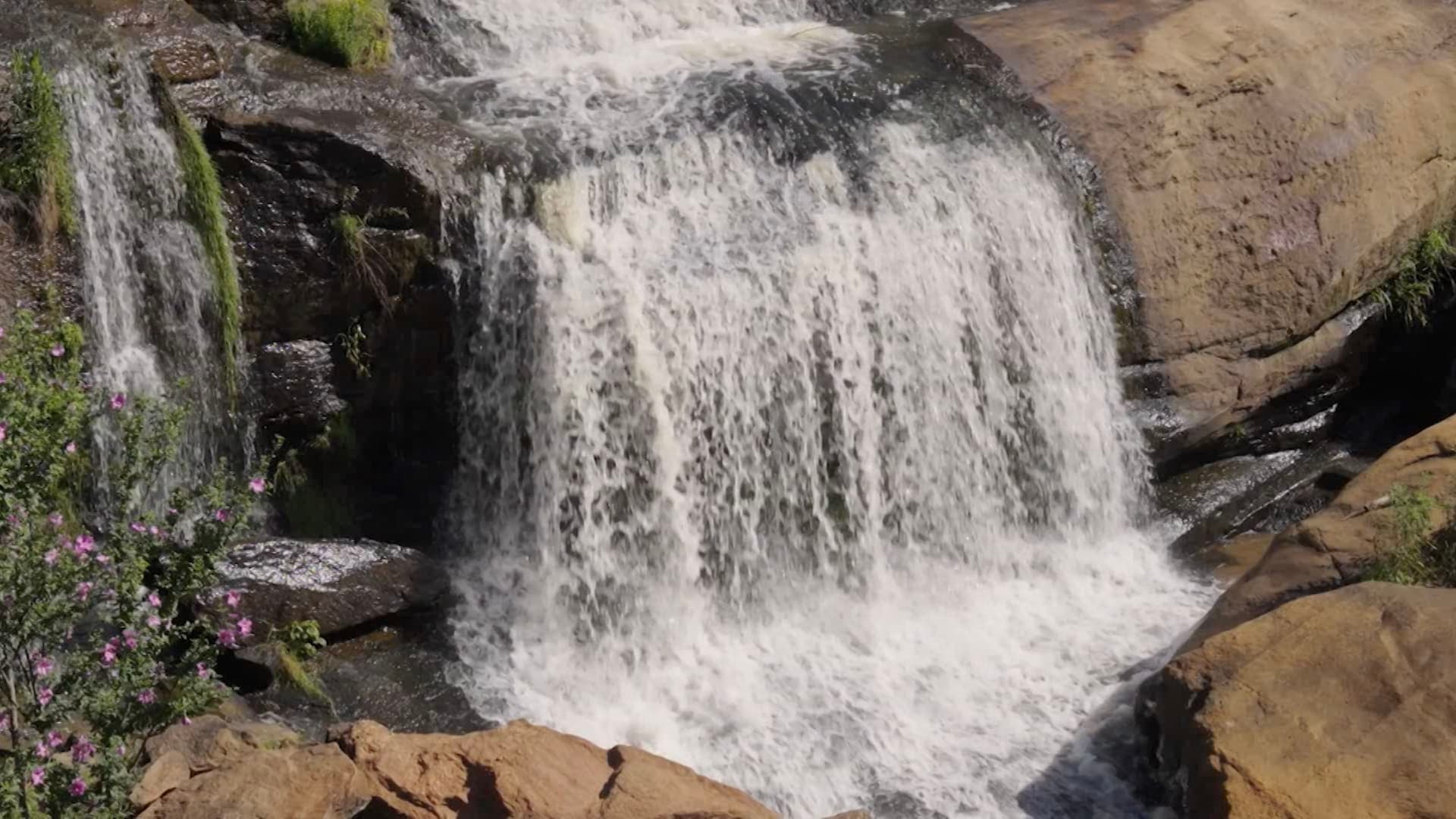 Waterfall near street in US city