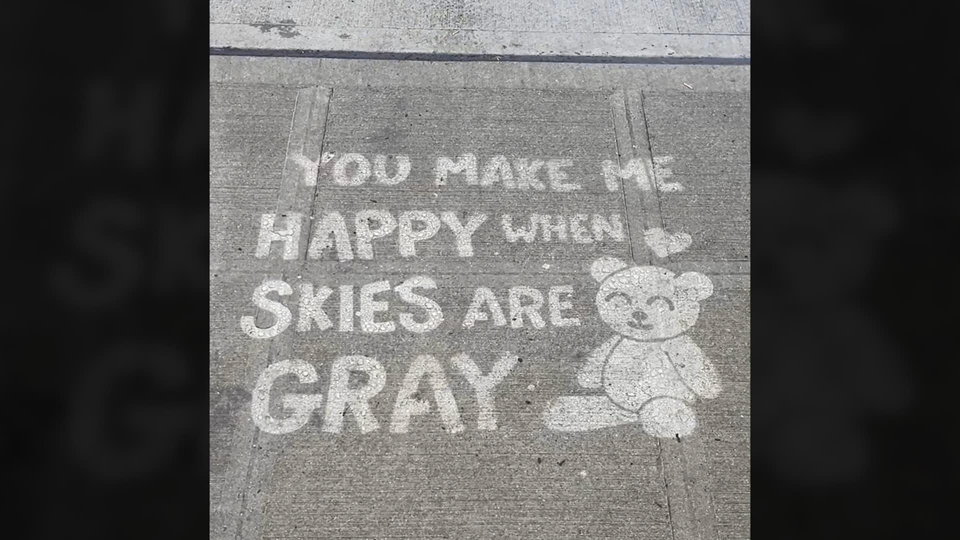 Rain-created street art