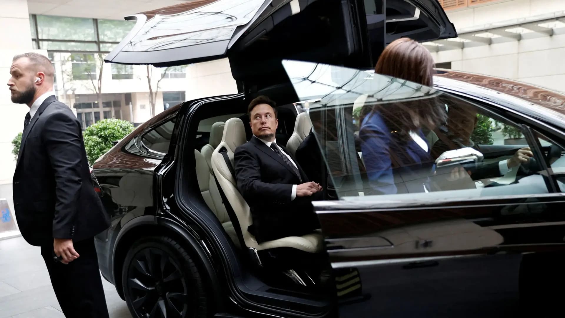 Musk's Empire Restructures Tesla Looks to Exit China