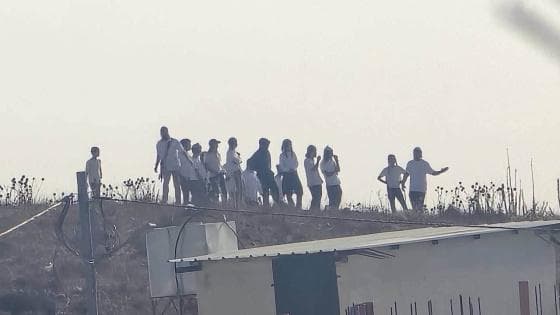 Settlers and forces storm Tal village