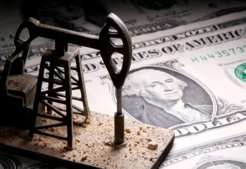 Oil falls below $100